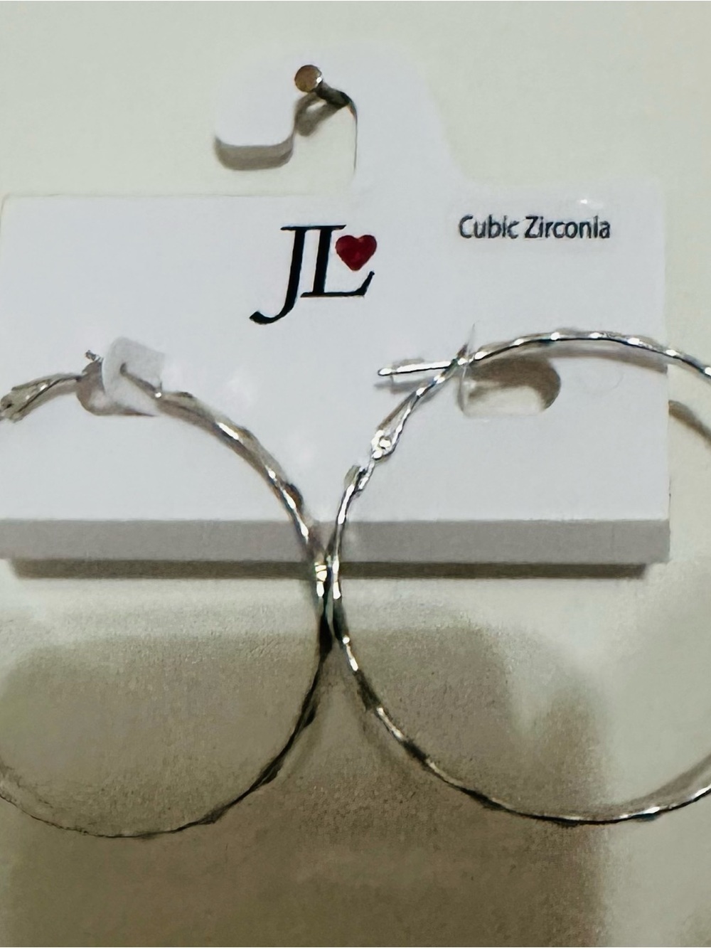 JL Silver-Tone Twisted Hoop Earrings - Silver